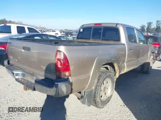 2005 Toyota Tacoma PreRunner with VIN 3TMKU72N75M001102, listed as a IAAI auction lot 41105774 with 233,167 mi miles. Bid and sale history available at carsss.com. Image 4.