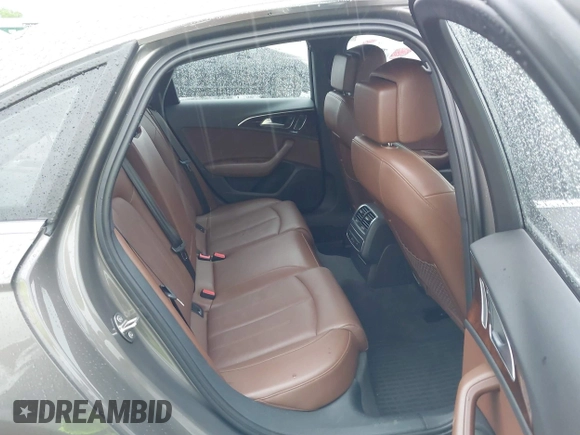 2014 Audi A6 Premium Plus z VIN WAUGFAFC3EN087176, wystawiony jako IAAI lot #42117602 z przebiegiem 53 571 mil mil oraz . Historia ofert i sprzedaży dostępna na DreamBid. Obrazek 8.