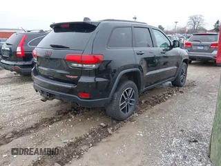 2019 Jeep Grand Cherokee Trailhawk with VIN 1C4RJFLT3KC554292, listed as a IAAI auction lot 41953049 with 31,672 mi miles and . Bid and sale history available at DreamBid. Image 4.