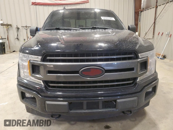 2020 Ford F-150 XL with VIN 1FTEW1E59LFA01308, listed as a Copart auction lot 52005385 with 63,711 mi miles and Salvage Title. Bid and sale history available at carsss.com. Image 5.