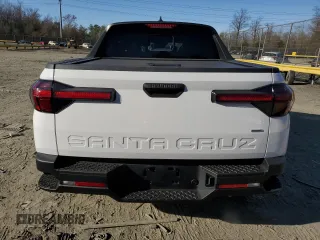 2024 Hyundai Santa Cruz SEL z VIN 5NTJCDDE1RH121355, wystawiony jako Copart lot #49340965 z przebiegiem 417 mil mil oraz Szkody całkowita. Historia ofert i sprzedaży dostępna na DreamBid. Obrazek 6.