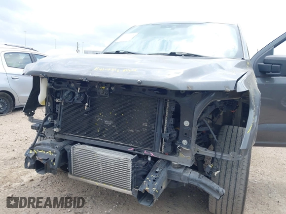 2021 Ford F-150 XL with VIN 1FTEW1CP1MKD21526, listed as a IAAI auction lot 42104907 with 76,317 mi miles and . Bid and sale history available at DreamBid. Image 6.