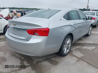 2014 Chevrolet Impala LT with VIN 2G1125S33E9103583, listed as a IAAI auction lot 42125293 with 143,951 mi miles and . Bid and sale history available at DreamBid. Image 4.