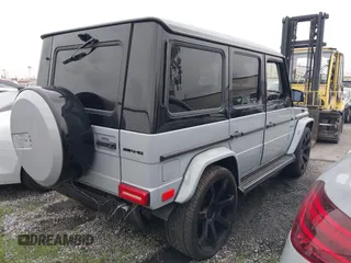 2010 Mercedes-Benz G-Class G 550 with VIN WDCYC3HF7AX183193, listed as a IAAI auction lot 41719654 with 164,191 mi miles. Bid and sale history available at carsss.com. Image 4.