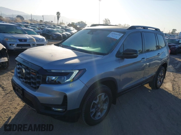 2023 Honda Passport TrailSport with VIN 5FNYF8H61PB028829, listed as a IAAI auction lot 41968490 with 20,090 mi miles. Bid and sale history available at carsss.com. Image 2.