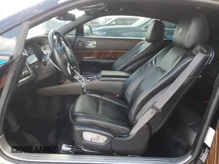 2015 Rolls-Royce Wraith z VIN SCA665C56FUX85095, wystawiony jako Copart lot #75506514 z przebiegiem 18 147 mil mil oraz Szkody całkowita. Historia ofert i sprzedaży dostępna na DreamBid. Obrazek 7.
