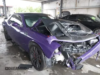 2018 Dodge Challenger R/T Scat Pack z VIN 2C3CDZFJ0JH283975, wystawiony jako IAAI lot #42196006 z przebiegiem 71 002 mil mil oraz . Historia ofert i sprzedaży dostępna na DreamBid. Obrazek 1.