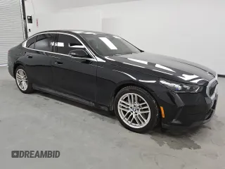 2024 BMW 5 Series 530i xDrive with VIN WBA53FJ03RCP96427, listed as a Copart auction lot 52829235 with 14,017 mi miles and Clean Title. Bid and sale history available at carsss.com. Image 4.