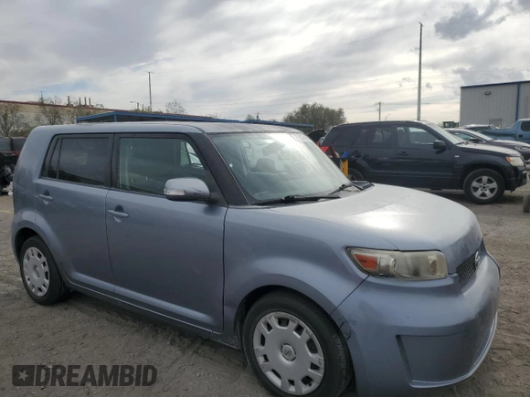 2010 Scion xB with VIN JTLZE4FE3A1100385, listed as a Copart auction lot 53754515 with 99,701 mi miles and Salvage Title. Bid and sale history available at DreamBid. Image 4.