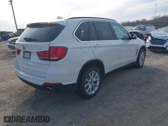 2016 BMW X5 xDrive35i with VIN 5UXKR0C5XG0P21683, listed as a IAAI auction lot 41717151 with 98,696 mi miles. Bid and sale history available at carsss.com. Image 4.