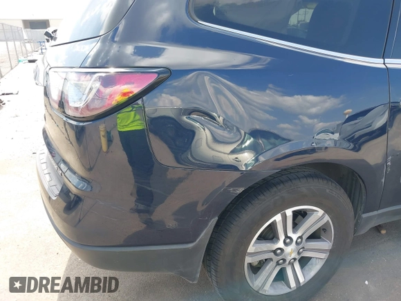 2015 Chevrolet Traverse LT with VIN 1GNKRHKD4FJ296745, listed as a IAAI auction lot 42334324 with 139,386 mi miles and . Bid and sale history available at DreamBid. Image 21.