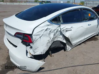 2018 Tesla Model 3 Long Range Battery with VIN 5YJ3E1EA3JF057527, listed as a IAAI auction lot 42072126 with 1 mi miles. Bid and sale history available at carsss.com. Image 6.