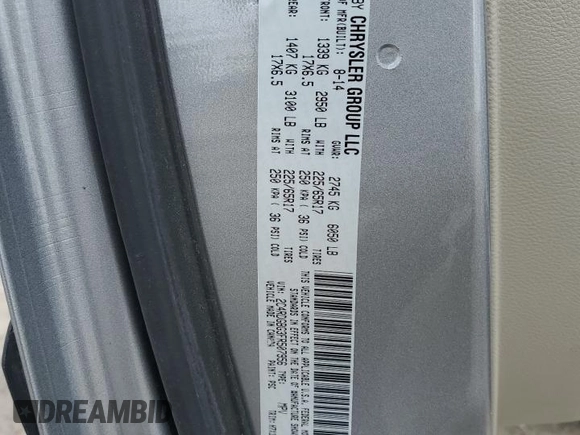2015 Dodge Grand Caravan American Value with VIN 2C4RDGBG3FR507956, listed as a Copart auction lot 55948415 with 88,534 mi miles and Salvage Title. Bid and sale history available at DreamBid. Image 13.