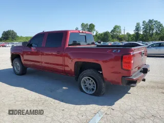 2018 Chevrolet Silverado 1500 LT with VIN 3GCUKREC5JG203272, listed as a Copart auction lot 61239994 with 82,485 mi miles and Salvage Title. Bid and sale history available at carsss.com. Image 2.