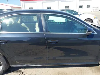 2013 Volkswagen Passat SE w/Sunroof with VIN 1VWBH7A36DC020984, listed as a IAAI auction lot 41883902 with 169,916 mi miles. Bid and sale history available at carsss.com. Image 13.