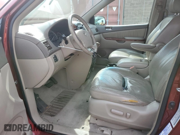2004 Toyota Sienna XLE with VIN 5TDBA22CX4S008957, listed as a Copart auction lot 54253945 with 142,716 mi miles and Salvage Title. Bid and sale history available at DreamBid. Image 7.