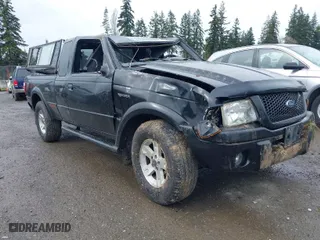 2002 Ford Ranger XL Fleet with VIN 1FTZR45E72PB64333, listed as a IAAI auction lot 41847330 with 210,328 mi miles. Bid and sale history available at carsss.com. Image 1.