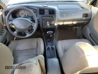 2001 Infiniti G20 Luxury z VIN JNKCP11A01T400404, wystawiony jako Copart lot #69899274 z przebiegiem 243 332 mil mil oraz Szkody całkowita. Historia ofert i sprzedaży dostępna na DreamBid. Obrazek 8.