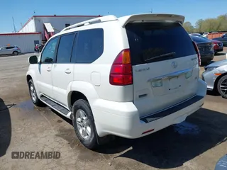 2007 Lexus GX with VIN JTJBT20X570144529, listed as a IAAI auction lot 42035412 with 265,886 mi miles. Bid and sale history available at carsss.com. Image 3.