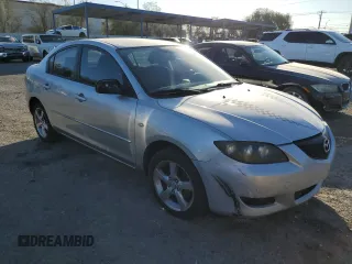 2004 Mazda 3 i with VIN JM1BK12F141168532, listed as a Copart auction lot 43964885 with 266,411 mi miles and Salvage Title. Bid and sale history available at DreamBid. Image 4.