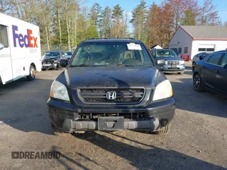 2004 Honda Pilot EX with VIN 5FNYF18484B001905, listed as a IAAI auction lot 42224000 with 254,787 mi miles and . Bid and sale history available at carsss.com. Image 13.
