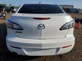 2012 Mazda 3 i Grand Touring with VIN JM1BL1W70C1668888, listed as a Copart auction lot 71848794 with 134,497 mi miles and Salvage Title. Bid and sale history available at carsss.com. Image 6.
