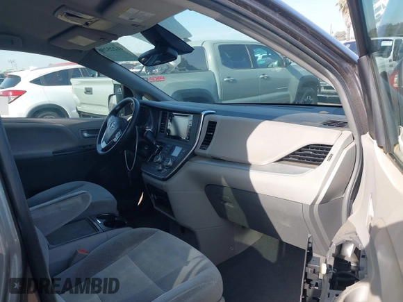 2019 Toyota Sienna LE Auto Access Seat with VIN 5TDKZ3DC4KS987948, listed as a IAAI auction lot 41225296 with 104,189 mi miles and . Bid and sale history available at DreamBid. Image 5.