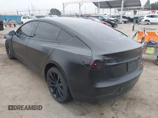 2019 Tesla Model 3 Mid Range with VIN 5YJ3E1EA8KF538083, listed as a IAAI auction lot 41891458 with 46,958 mi miles and . Bid and sale history available at carsss.com. Image 3.