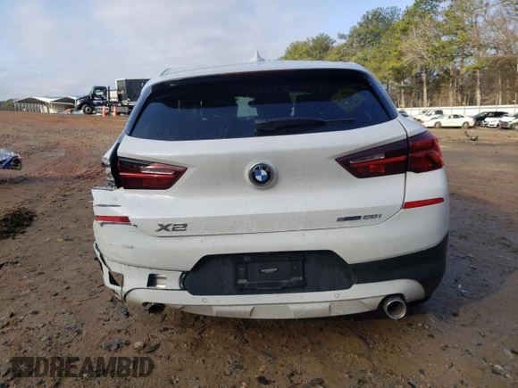 2022 BMW X2 sDrive28i with VIN WBXYH9C05N5T67775, listed as a Copart auction lot 44045505 with 34,100 mi miles and Salvage Title. Bid and sale history available at carsss.com. Image 6.