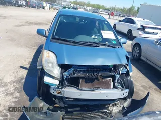 2010 Toyota Yaris with VIN JTDJT4K36A5285298, listed as a IAAI auction lot 42003609 with 158,418 mi miles. Bid and sale history available at carsss.com. Image 12.