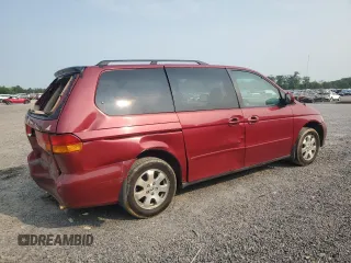 2004 Honda Odyssey EX-L with VIN 5FNRL18024B008617, listed as a Copart auction lot 58831435 with Not provided miles and Salvage title. Bid and sale history available at DreamBid. Image 3.
