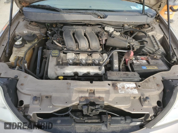 2005 Mercury Sable LS z VIN 1MEFM55S85A612114, wystawiony jako Copart lot #45853165 z przebiegiem Nie podano mil oraz Szkody całkowita. Historia ofert i sprzedaży dostępna na DreamBid. Obrazek 11.