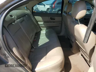 2004 Mercury Sable LS Premium z VIN 1MEFM55S34G611027, wystawiony jako Copart lot #50611585 z przebiegiem 224 081 mil mil oraz Tytuł czysty. Historia ofert i sprzedaży dostępna na DreamBid. Obrazek 11.