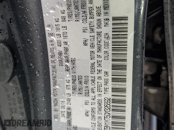 2016 Mazda 3 i Touring with VIN 3MZBM1M75GM326892, listed as a Copart auction lot 86402974 with 102,216 mi miles and Salvage Title. Bid and sale history available at DreamBid. Image 14.