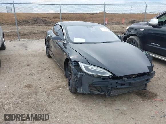 2017 Tesla Model S 100D z VIN 5YJSA1E27HF208282, wystawiony jako IAAI lot #41362736 z przebiegiem 173 162 mil mil oraz . Historia ofert i sprzedaży dostępna na DreamBid. Obrazek 1.