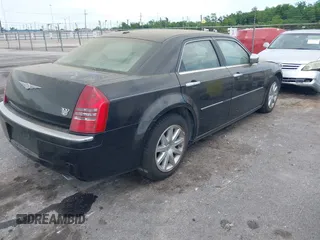 2007 Chrysler 300 C with VIN 2C3LA63H97H861511, listed as a IAAI auction lot 42136495 with 113,972 mi miles. Bid and sale history available at carsss.com. Image 4.
