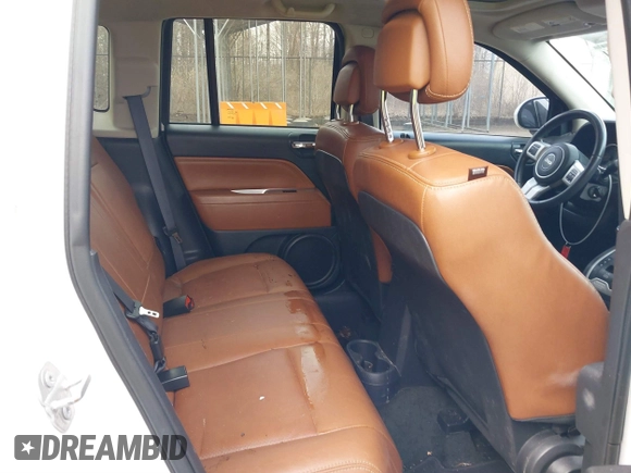 2016 Jeep Compass Latitude with VIN 1C4NJDEBXGD737018, listed as a IAAI auction lot 41800071 with 158,006 mi miles. Bid and sale history available at carsss.com. Image 8.