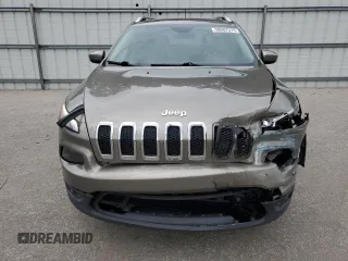 2018 Jeep Cherokee Latitude with VIN 1C4PJMCX9JD570763, listed as a Copart auction lot 58987315 with 131,990 mi miles and Salvage title. Bid and sale history available at DreamBid. Image 5.