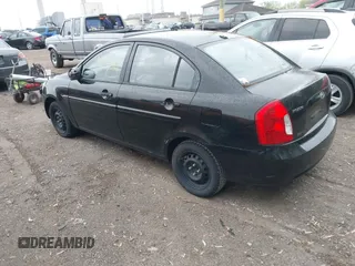 2010 Hyundai Accent GLS with VIN KMHCN4AC1AU445545, listed as a IAAI auction lot 42175319 with 70,000 mi miles. Bid and sale history available at carsss.com. Image 3.