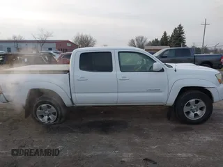 2006 Toyota Tacoma PreRunner z VIN 5TEJU62N06Z284114, wystawiony jako IAAI lot #41285658 z przebiegiem 92 160 mil mil oraz . Historia ofert i sprzedaży dostępna na DreamBid. Obrazek 14.