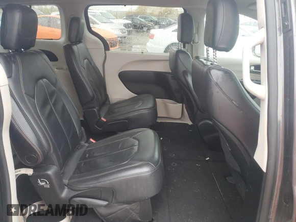 2017 Chrysler Pacifica Touring L with VIN 2C4RC1BG4HR810277, listed as a Copart auction lot 77885014 with 101,492 mi miles and Salvage Title. Bid and sale history available at DreamBid. Image 11.