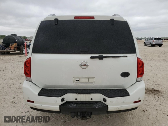 2014 Nissan Armada SV z VIN 5N1BA0ND9EN610504, wystawiony jako Copart lot #53310295 z przebiegiem 133 166 mil mil oraz Szkoda całkowita • Salvage title. Historia ofert i sprzedaży dostępna na DreamBid. Obrazek 6.