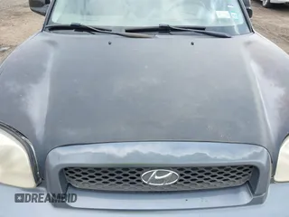 2004 Hyundai Santa Fe GLS with VIN KM8SC73D54U714336, listed as a IAAI auction lot 42079721 with 104,751 mi miles. Bid and sale history available at carsss.com. Image 12.