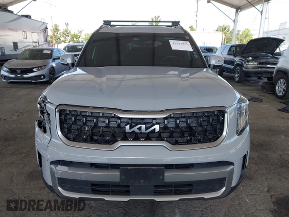 2023 Kia Telluride EX X-Line z VIN 5XYP3DGC0PG395945, wystawiony jako IAAI lot #42544923 z przebiegiem 19 046 mil mil oraz . Historia ofert i sprzedaży dostępna na DreamBid. Obrazek 12.