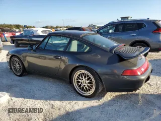 1995 Porsche 911 Carrera with VIN WP0AA2994SS323280, listed as a Copart auction lot 75304104 with 105,675 mi miles and Salvage Title. Bid and sale history available at carsss.com. Image 2.
