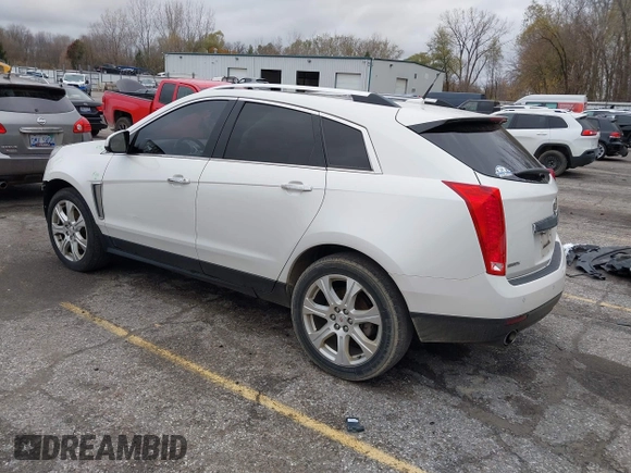 2014 Cadillac SRX Premium Collection z VIN 3GYFNDE34ES548826, wystawiony jako IAAI lot #40792942 z przebiegiem 115 984 mil mil oraz . Historia ofert i sprzedaży dostępna na DreamBid. Obrazek 3.