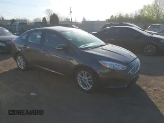 2016 Ford Focus SE with VIN 1FADP3F2XGL207906, listed as a IAAI auction lot 42099203 with 95,527 mi miles. Bid and sale history available at carsss.com. Image 1.