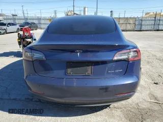 2021 Tesla Model 3 Long Range with VIN 5YJ3E1EBXMF925147, listed as a Copart auction lot 49741275 with 106,947 mi miles and Salvage Title. Bid and sale history available at DreamBid. Image 6.