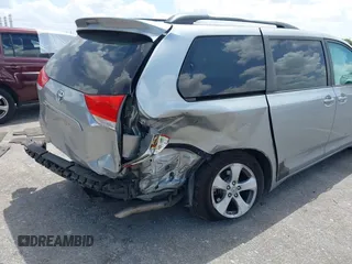 2013 Toyota Sienna LE AAS with VIN 5TDKK3DC4DS399295, listed as a IAAI auction lot 42173970 with 128,350 mi miles and . Bid and sale history available at DreamBid. Image 6.