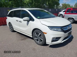 2018 Honda Odyssey Elite z VIN 5FNRL6H96JB080220, wystawiony jako IAAI lot #42319289 z przebiegiem 75 567 mil mil oraz . Historia ofert i sprzedaży dostępna na DreamBid. Obrazek 1.